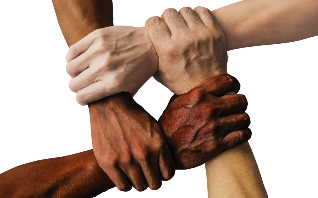 hands clasped in support and inclusion