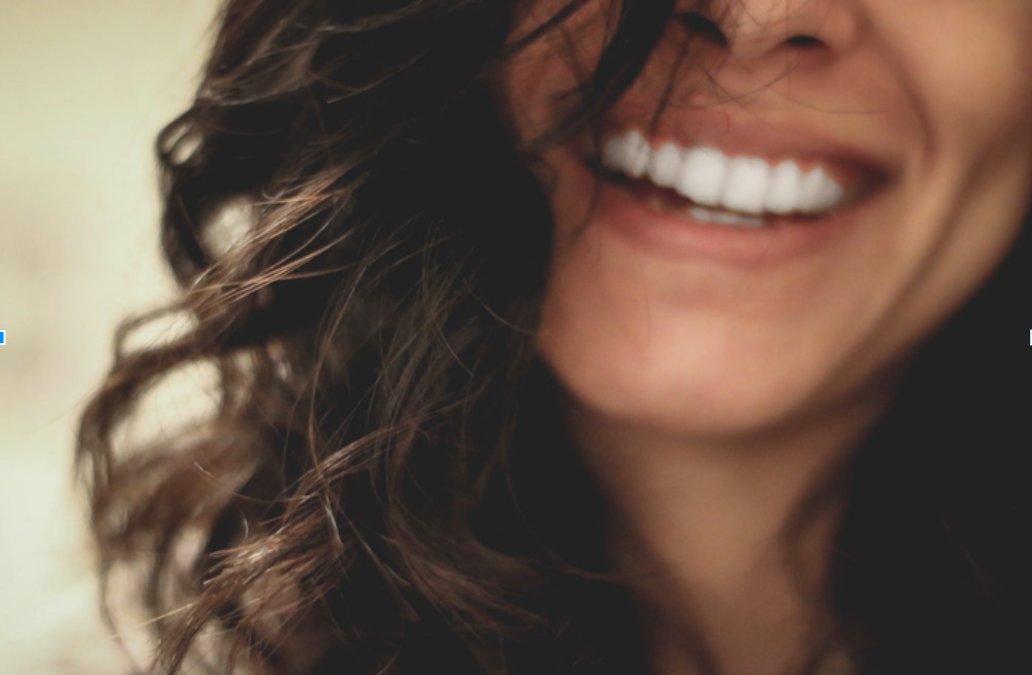 The mental health benefits of smiling