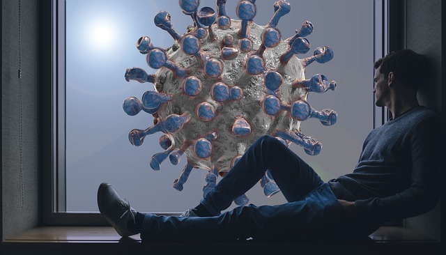Man looking at the 3 dimensional representation of a virus