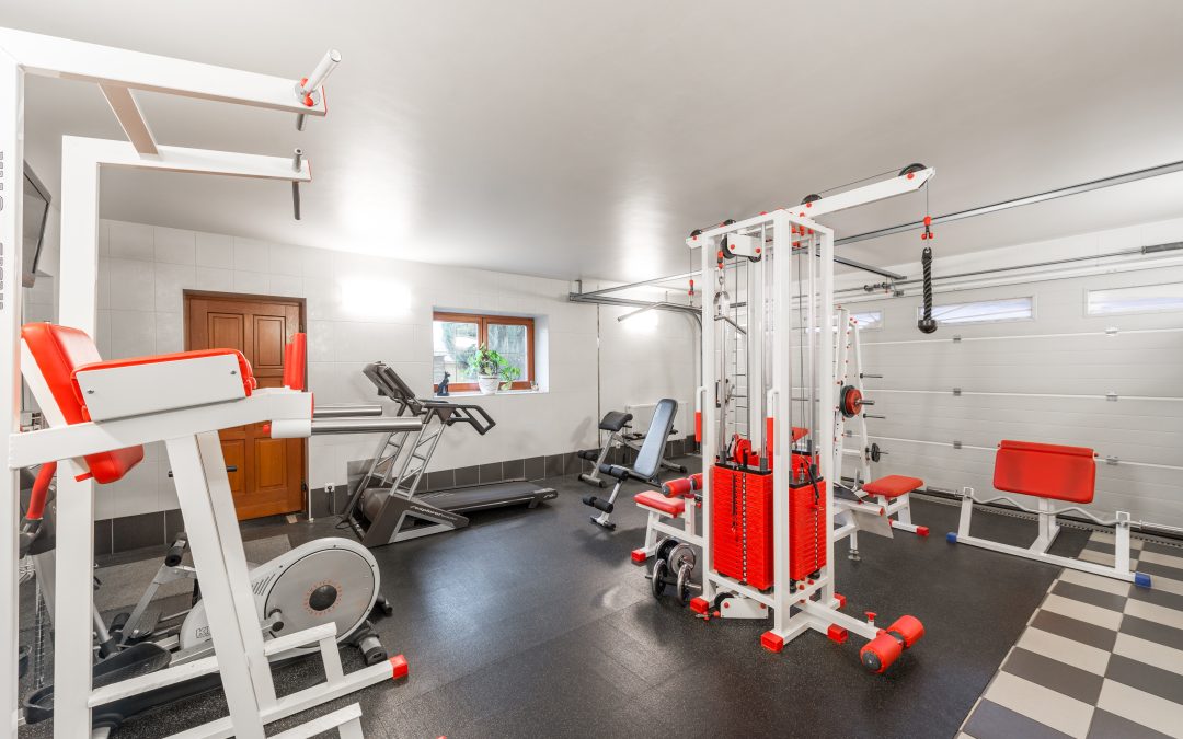 Home gym with equipment in basement