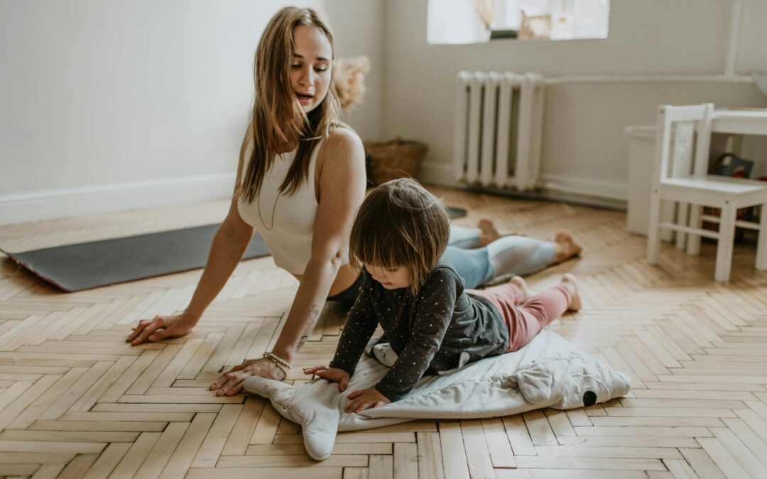 A woman managing anxiety without medication by doing yoga with her daughter