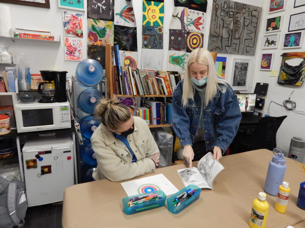 Community Center back room art space with 2 women in the background