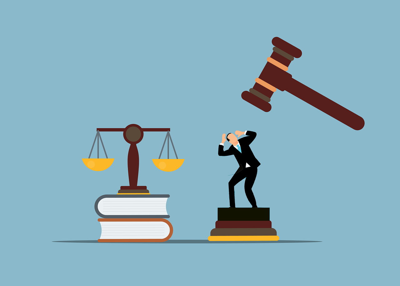 Law and Ethics with Scales of Justice and Gavel